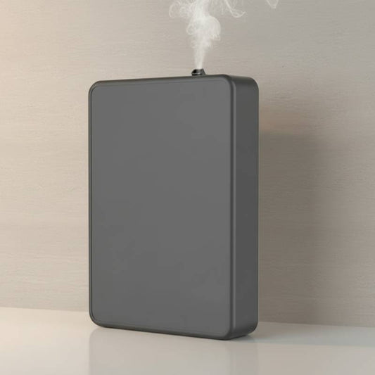 Diffuseur d’arômes 500ml Bluetooth effet bois clair posée sur table de salon moderne