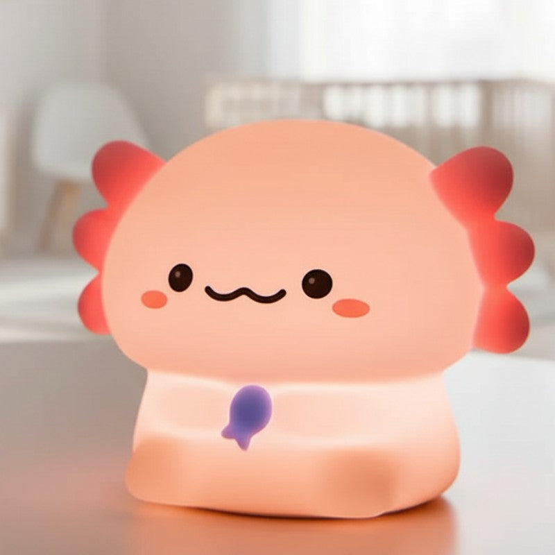 Axolotl lumineux posé sur bureau enfant